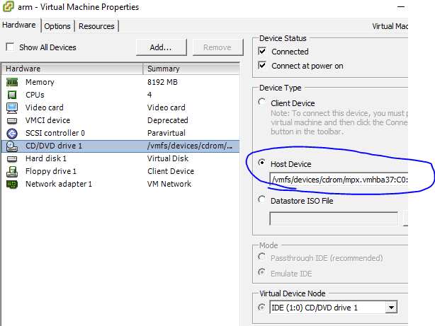 VMware Machine Properties, select CD/DVD drive, set Device Type to Host Device and select the optical drive.