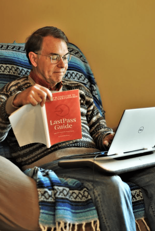 Dad reading the LastPass Guide